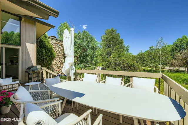 a view of a backyard with plants