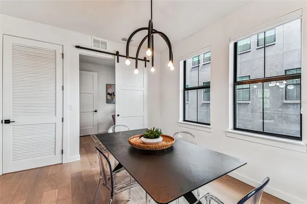a bathroom with a shower and a sink