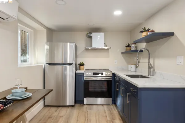 a close view of sink and cabinets