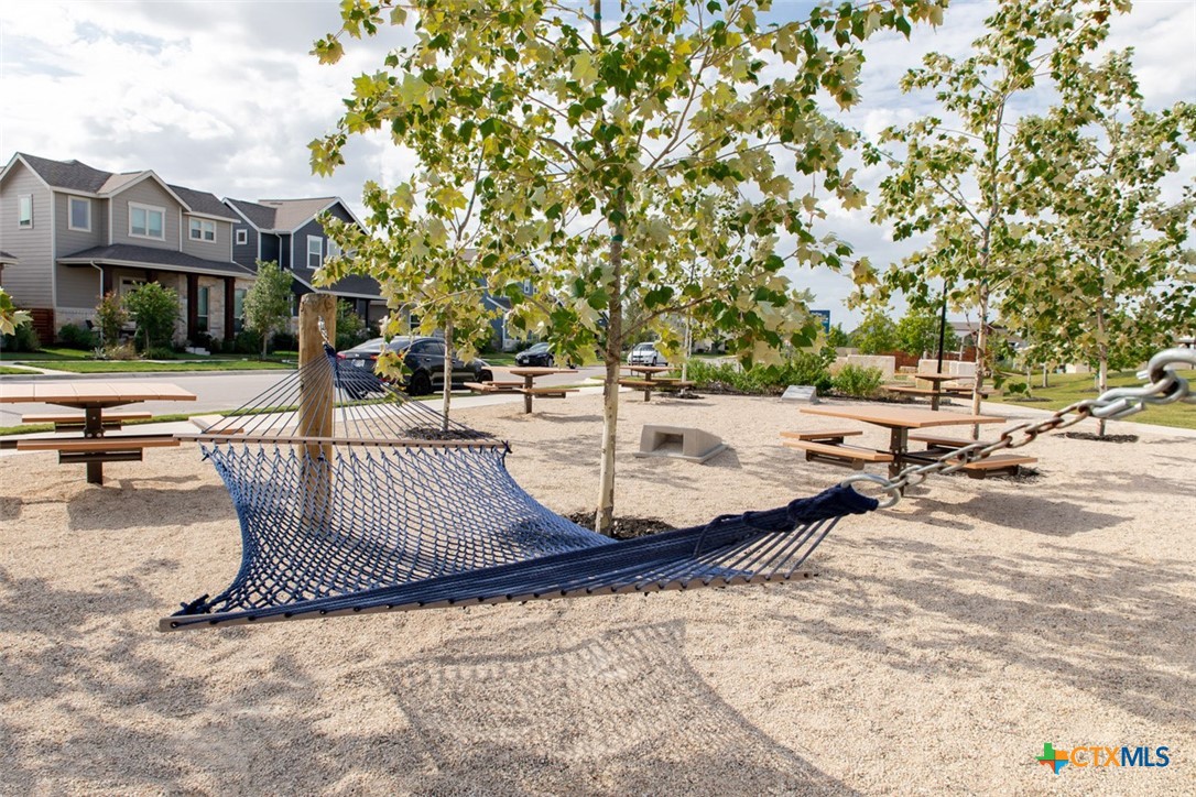 6313 McMurtry Street Austin, TX 78747 - Photo 9 of 12 a view of outdoor space with seating area