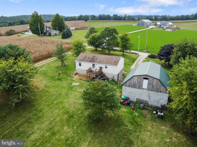 an aerial view of a house with garden