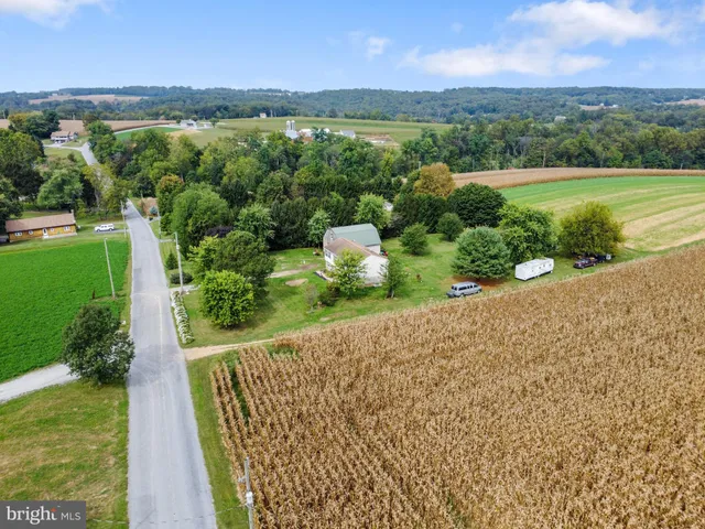 a view of a lake with a yard