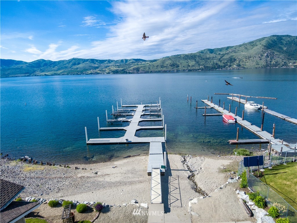 100 Wall Street Manson, WA 98831 - Photo 13 of 20 a view of a lake with a mountain