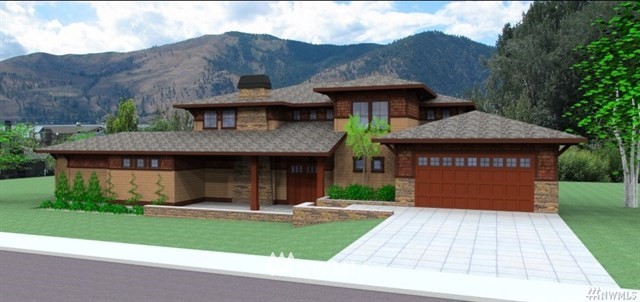 100 Wall Street Manson, WA 98831 - Photo 18 of 20 a front view of a house with a garden