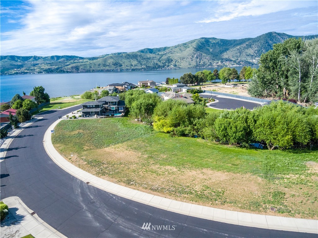 100 Wall Street Manson, WA 98831 - Photo 3 of 20 a view of a lake with a mountain in the background