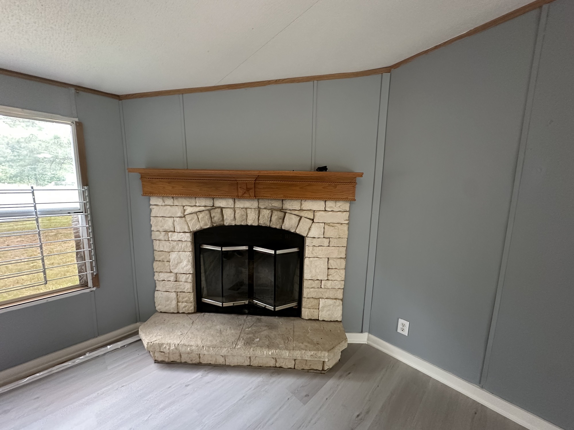 2229 Meekins Road Cleveland, TX 77328 - Photo 4 of 48 a living room with a fireplace