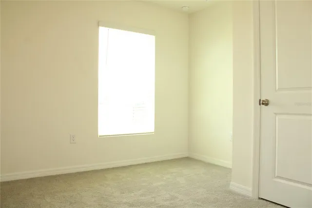 a view of a small space with a window