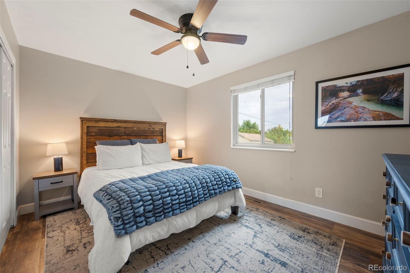 186 Quaker Street Golden, CO 80401 - Photo 16 of 50 a bedroom with a large bed and a window
