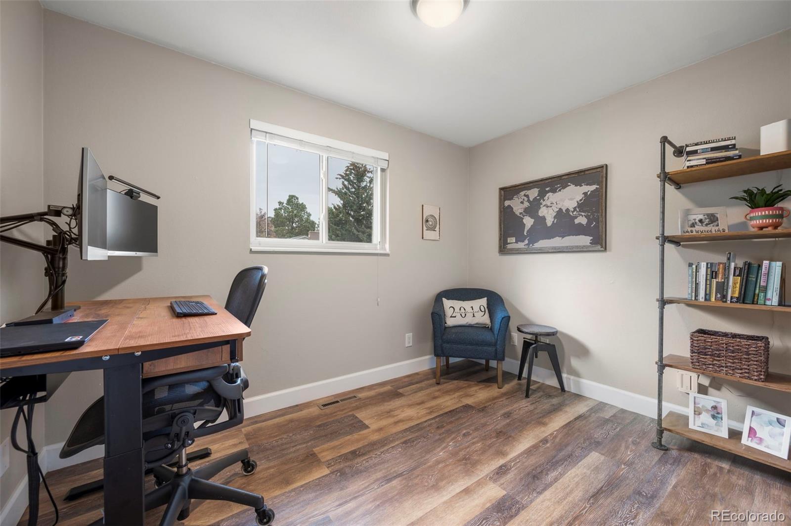 186 Quaker Street Golden, CO 80401 - Photo 18 of 50 a view of a workspace with furniture and a workspace