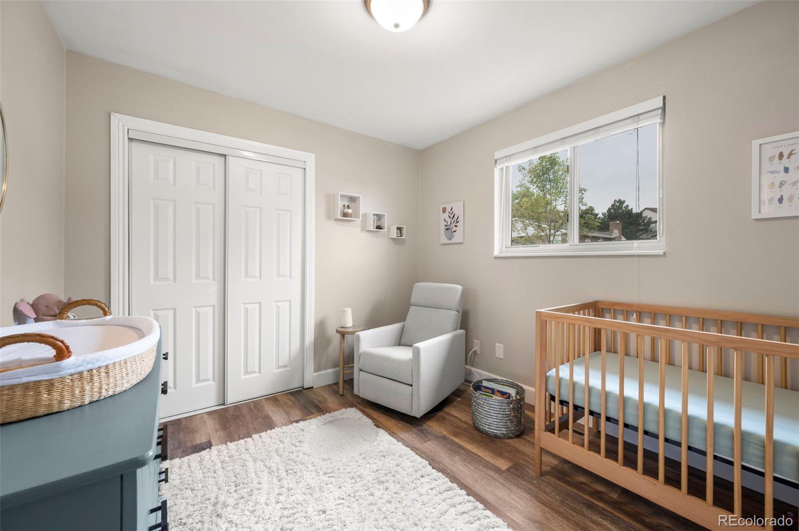 186 Quaker Street Golden, CO 80401 - Photo 20 of 50 a bedroom with furniture and a window