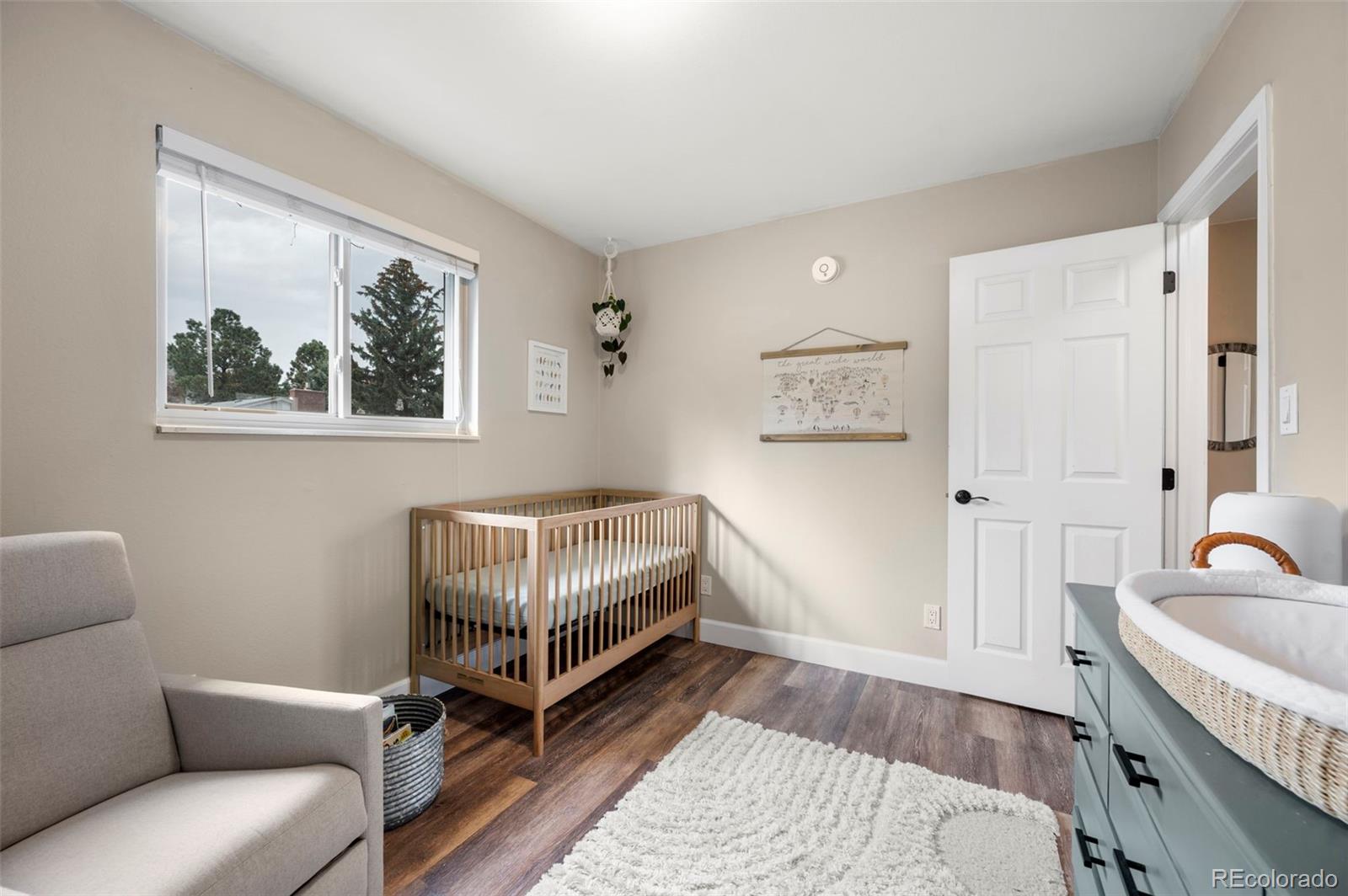 186 Quaker Street Golden, CO 80401 - Photo 21 of 50 a living room with furniture and a rug