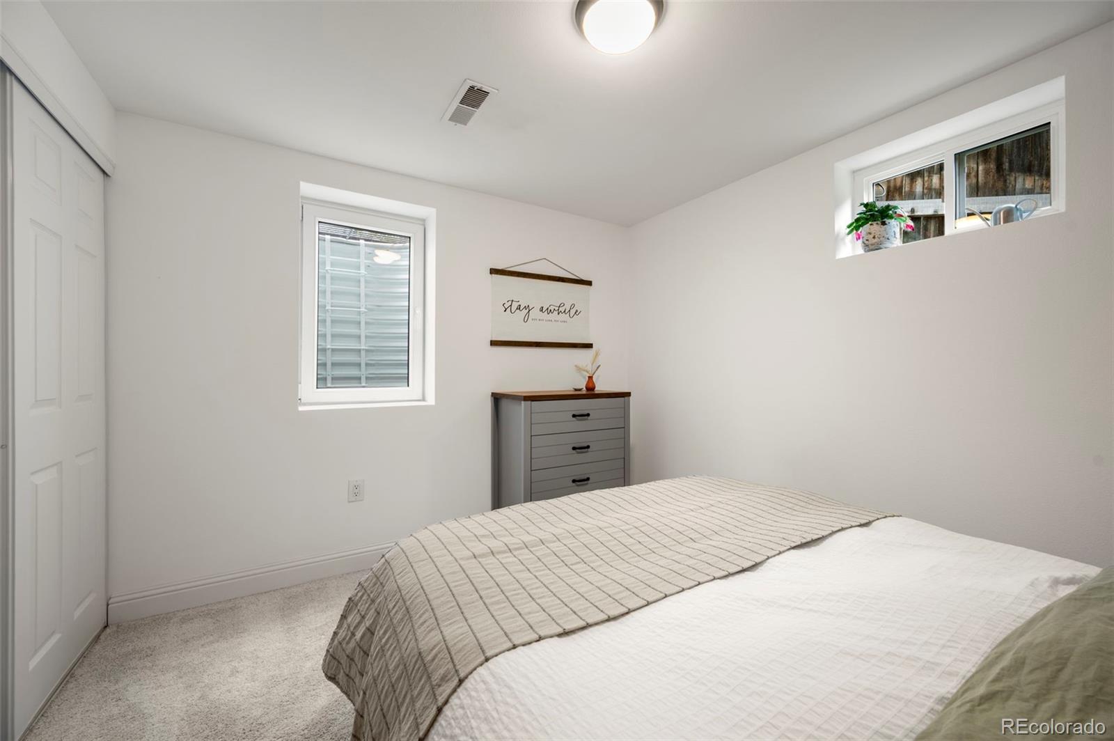 186 Quaker Street Golden, CO 80401 - Photo 30 of 50 a bedroom with a bed and a window