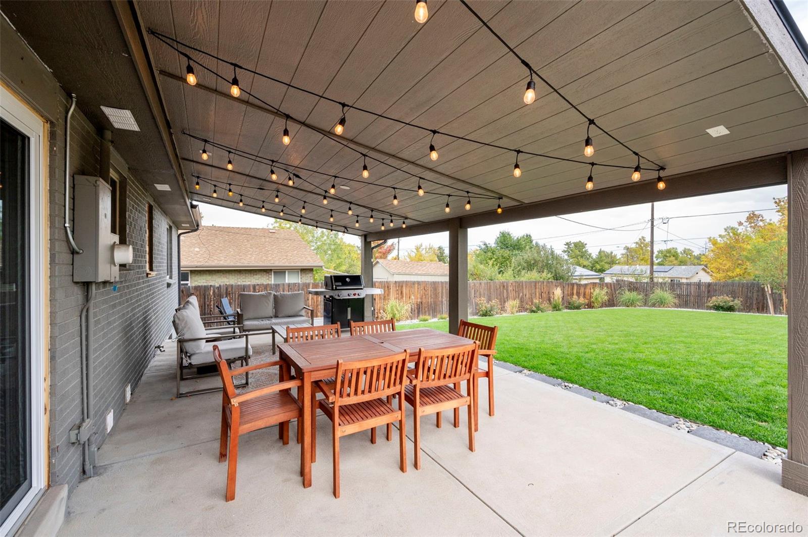 186 Quaker Street Golden, CO 80401 - Photo 38 of 50 a view of a patio with a table and chairs