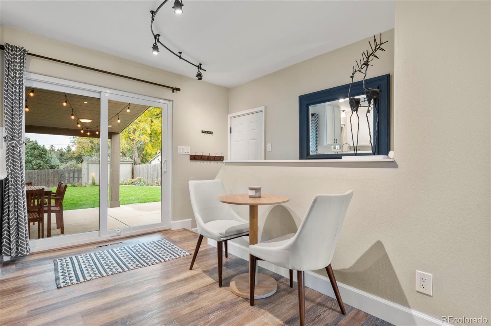186 Quaker Street Golden, CO 80401 - Photo 9 of 50 a view of a dining room with furniture window and outside view