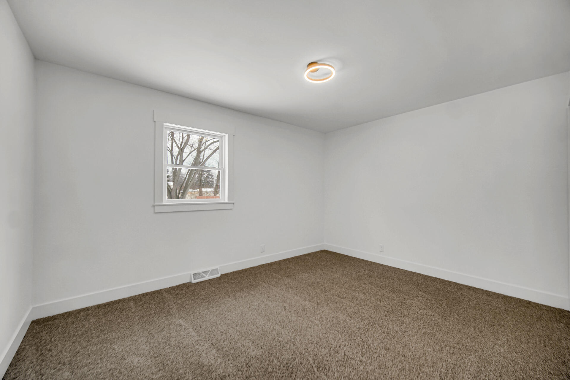 2792 Irving Street Portage, IN 46368 - Photo 13 of 16 an empty room with a window