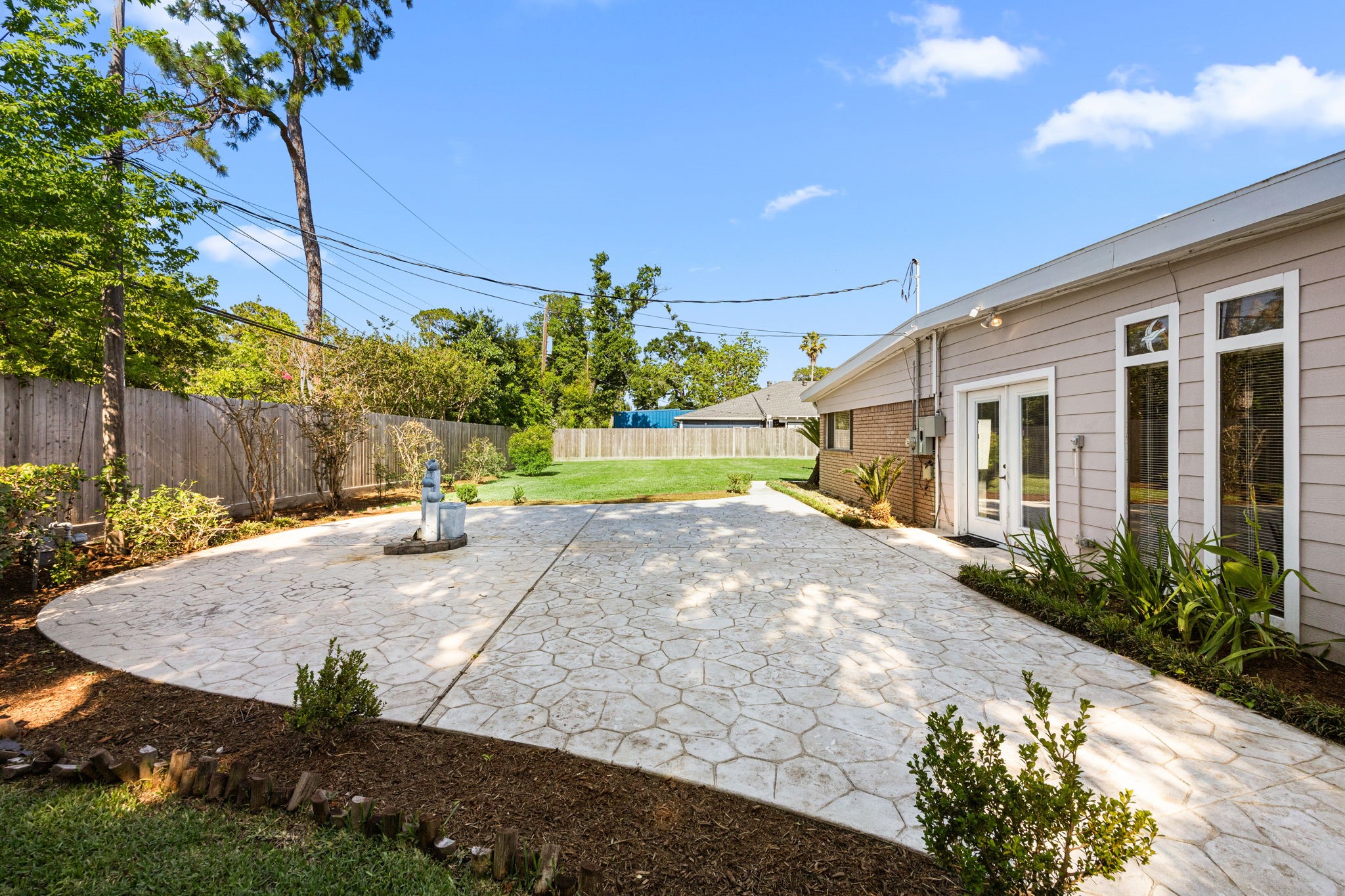 10310 Mayfield Road Houston, TX 77043 - Photo 40 of 49 Large back patio plus plenty of green space