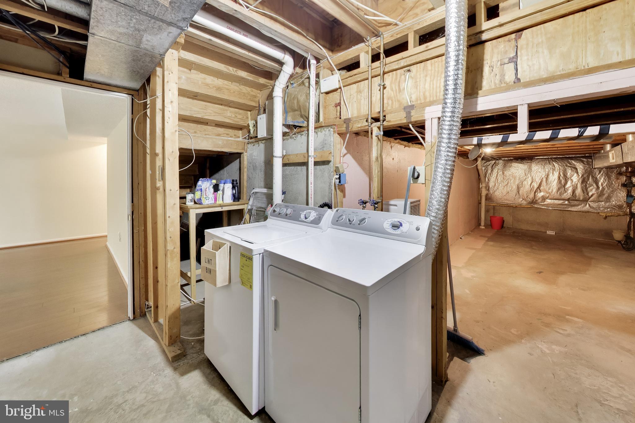 2421 Pondside Terrace Silver Spring, MD 20906 - Photo 36 of 44 Basement laundry with adjacent storage space