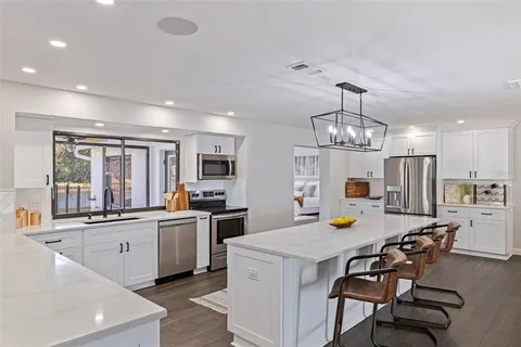 $895,000 | 8950 Baywood Park Drive, Seminole, FL 33777