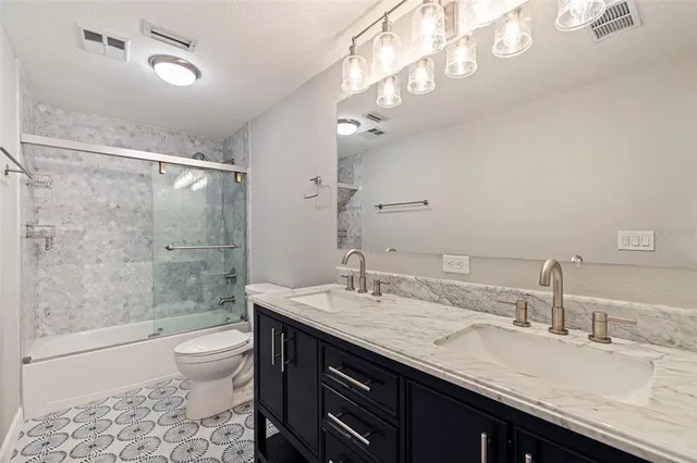 $895,000 | 8950 Baywood Park Drive, Seminole, FL 33777