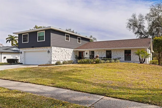 $895,000 | 8950 Baywood Park Drive, Seminole, FL 33777