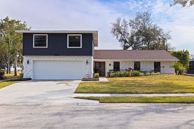 $895,000 | 8950 Baywood Park Drive, Seminole, FL 33777