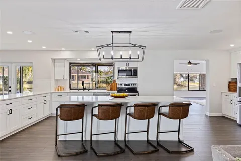 $895,000 | 8950 Baywood Park Drive, Seminole, FL 33777