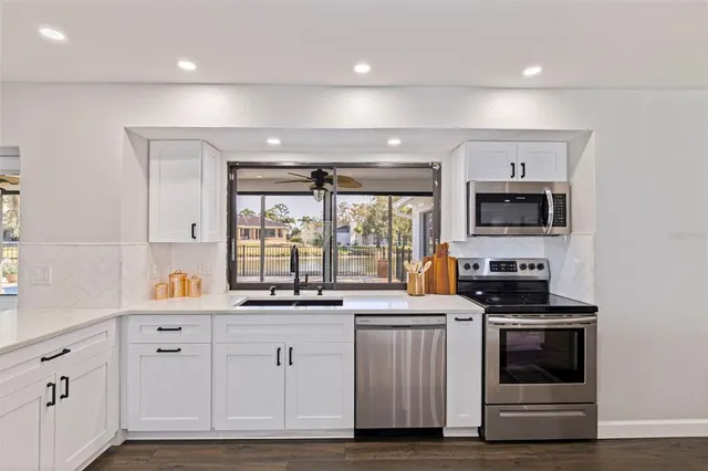 $895,000 | 8950 Baywood Park Drive, Seminole, FL 33777