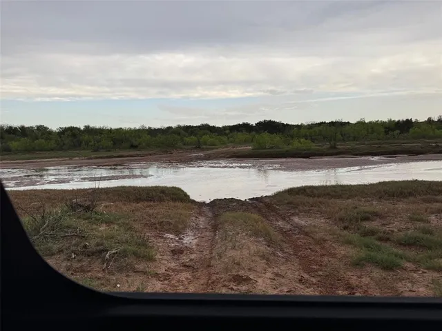 a view of lake with mountain