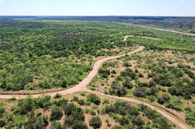 a view of a yard with an outdoor space