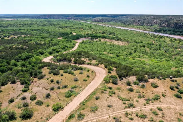 a view of a yard with an outdoor space