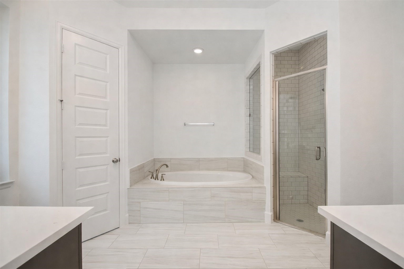3011 Harbor Spring Way Manvel, TX 77578 - Photo 17 of 29 a bathroom with a bathtub and a sink