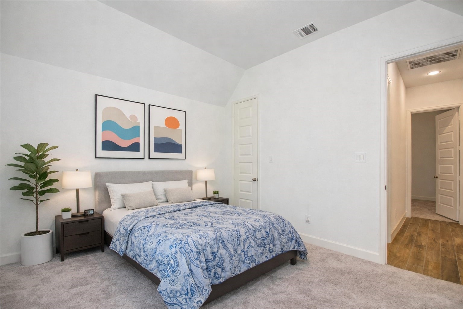 3011 Harbor Spring Way Manvel, TX 77578 - Photo 21 of 29 a bedroom with a bed and a painting on the wall