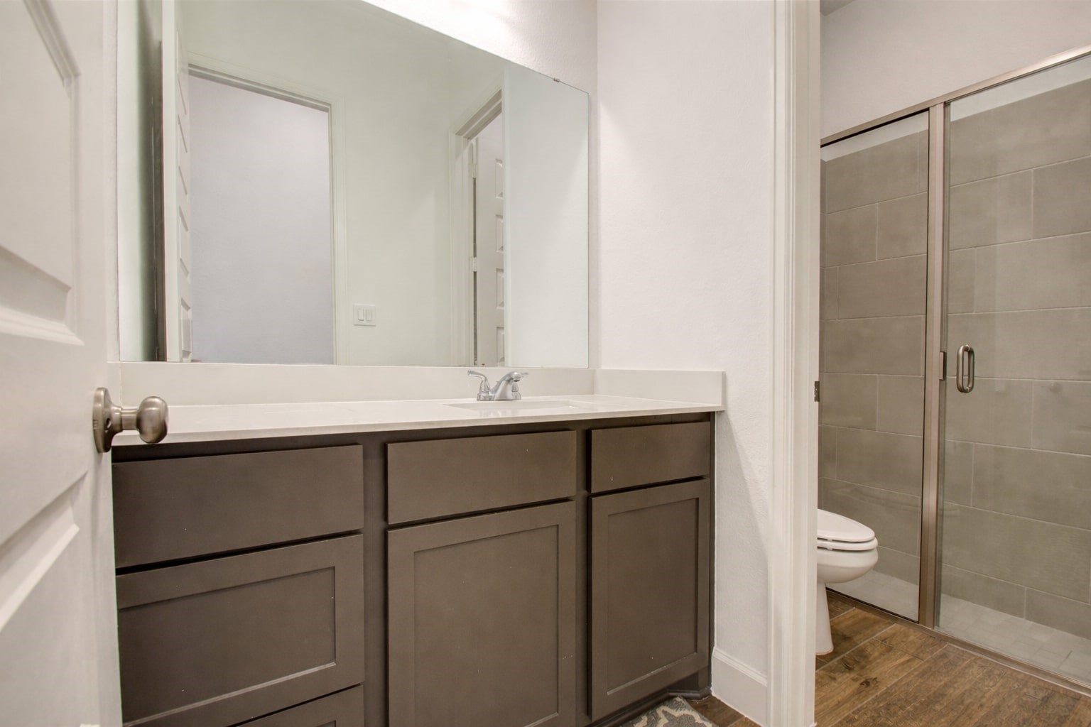 3011 Harbor Spring Way Manvel, TX 77578 - Photo 22 of 29 a bathroom with a sink and a toilet