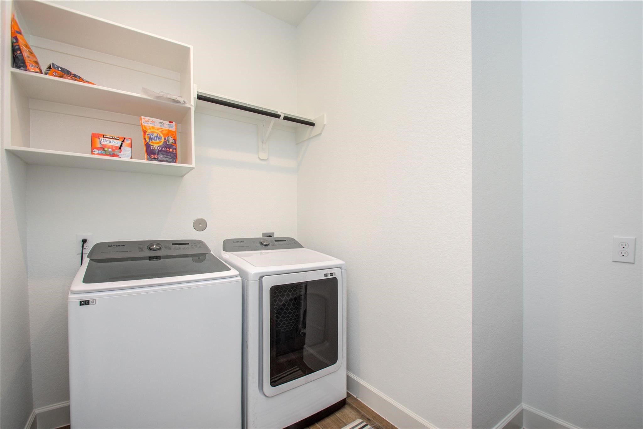 3011 Harbor Spring Way Manvel, TX 77578 - Photo 25 of 29 a utility room with dryer and washer