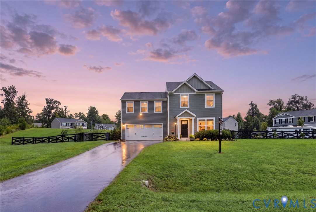 6801 Oakfork Loop New Kent, VA 23124 - Photo 2 of 28 Two-story residence with a two-car garage, gray si