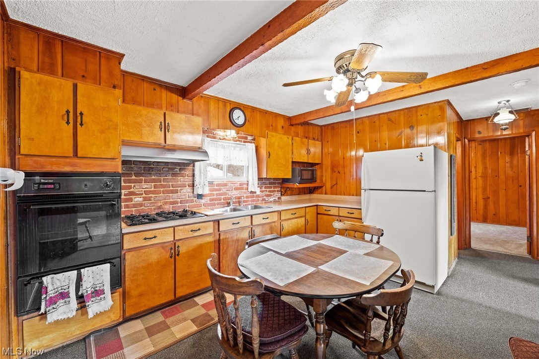 7221 Euclid Chardon Road Kirtland, OH 44094 - Photo 12 of 30 Eat in Kitchen with view into hallway