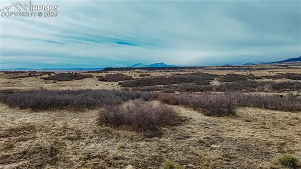 a view of a lake and mountain