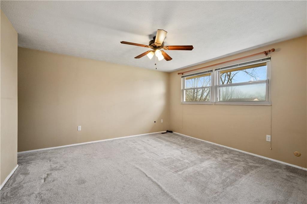 2203 Open Meadow Circle Bridgeville, PA 15017 - Photo 13 of 29 a view of an empty room with a window