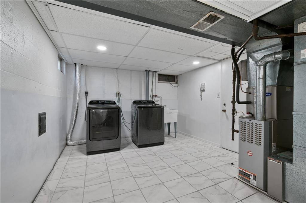 2203 Open Meadow Circle Bridgeville, PA 15017 - Photo 20 of 29 a kitchen with stainless steel appliances granite countertop a refrigerator and a stove