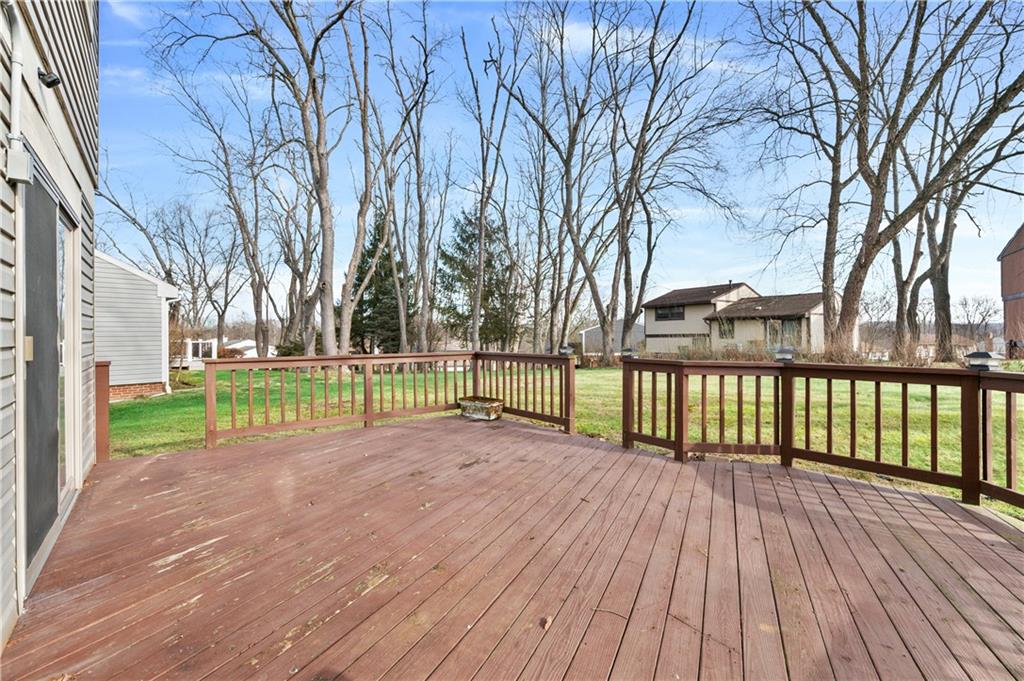 2203 Open Meadow Circle Bridgeville, PA 15017 - Photo 23 of 29 a view of a deck with a trees