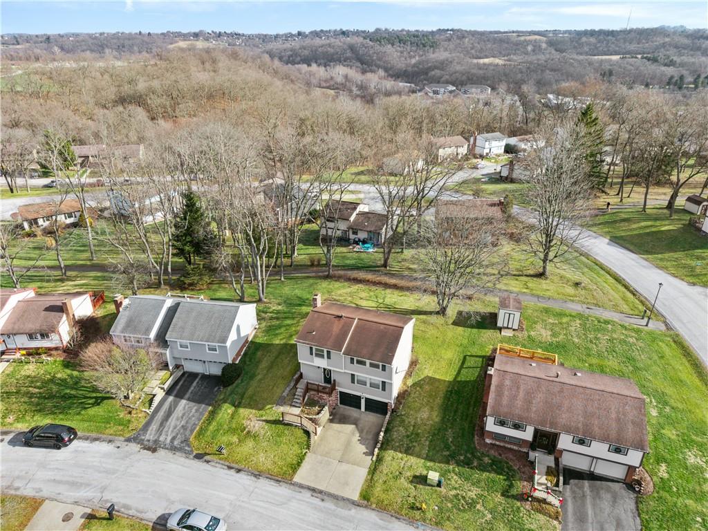 2203 Open Meadow Circle Bridgeville, PA 15017 - Photo 26 of 29 an aerial view of a house with a big yard