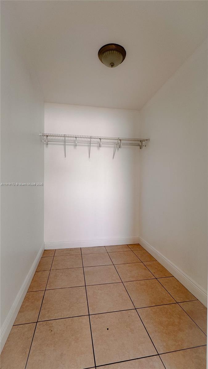 1835 Northwest 94th Street Miami, FL 33147 - Photo 22 of 22 a view of a room with an empty racks