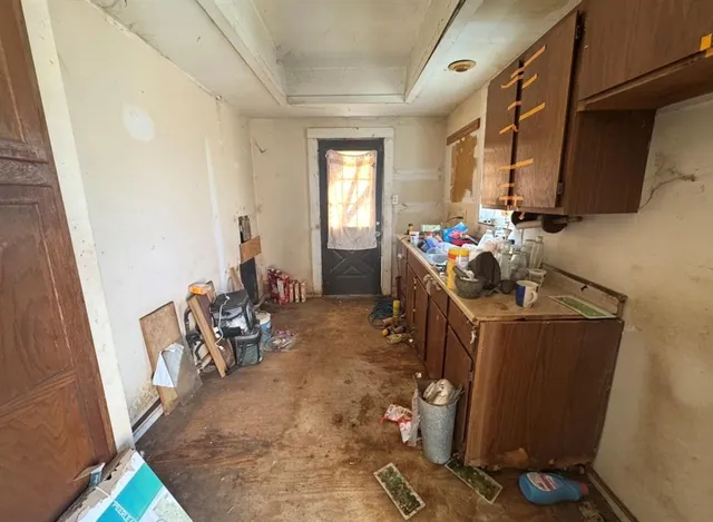 a room with furniture and a window