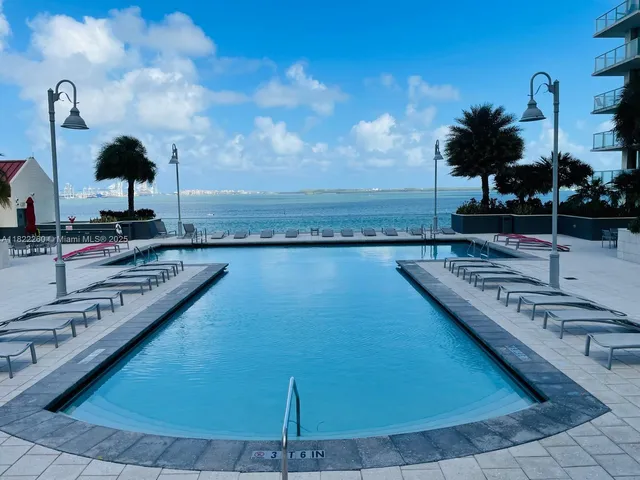 a view of a tennis court with a chair