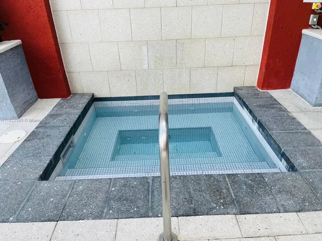 a view of balcony with furniture