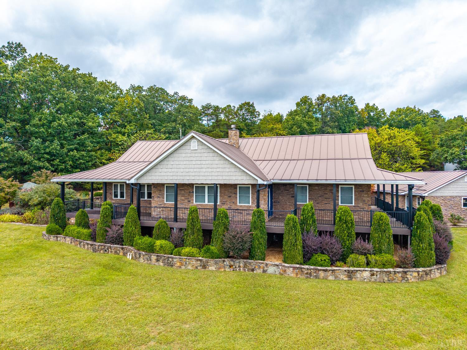 1704 Dearing Ford Road Altavista, VA 24517 - Photo 15 of 82 a front view of a house with a garden
