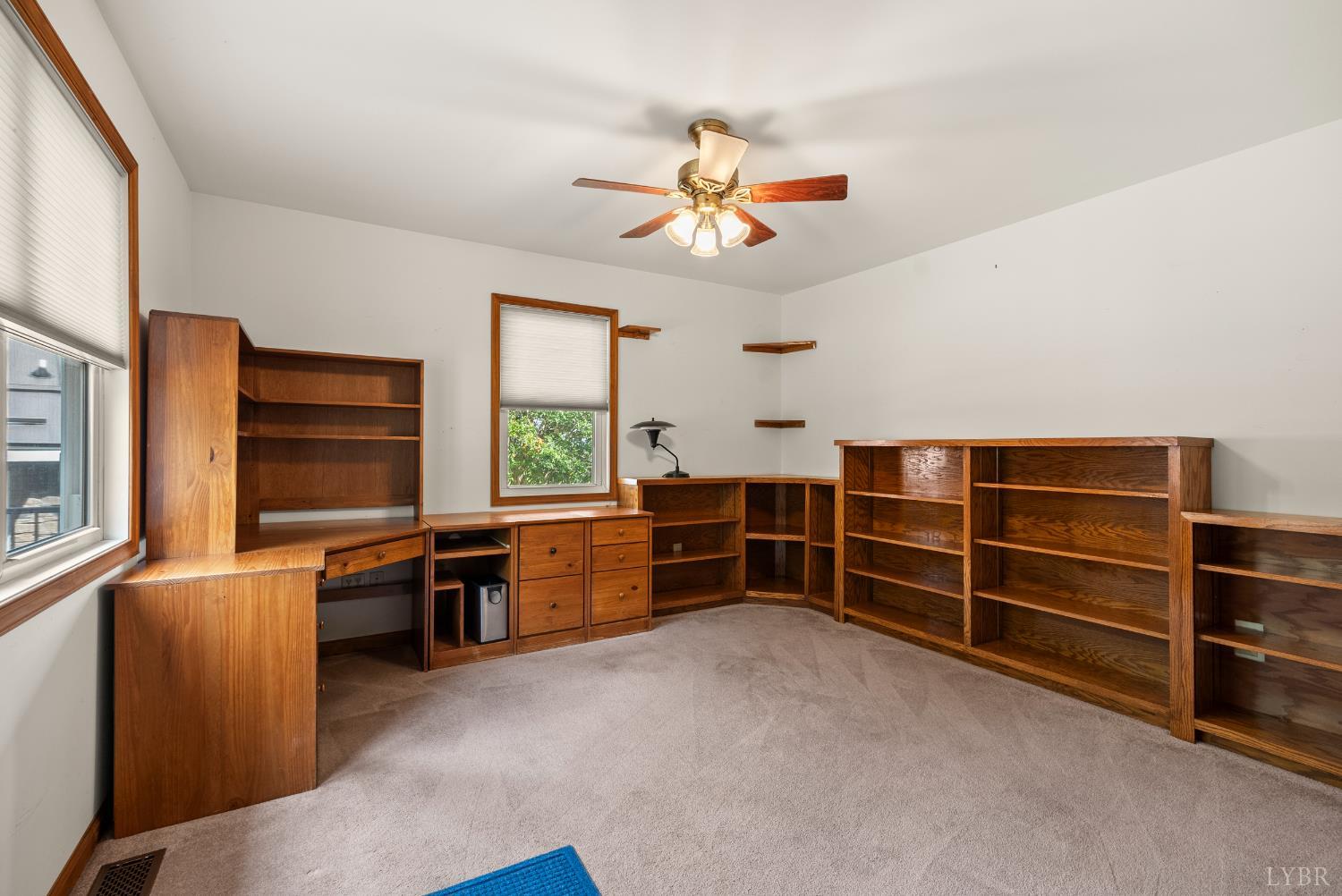 1704 Dearing Ford Road Altavista, VA 24517 - Photo 20 of 82 a room with furniture a window and a ceiling fan