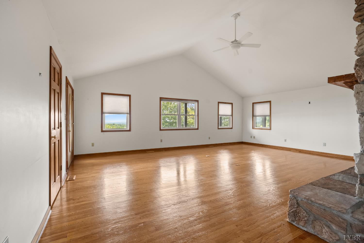 1704 Dearing Ford Road Altavista, VA 24517 - Photo 22 of 82 an empty room with wooden floor and windows