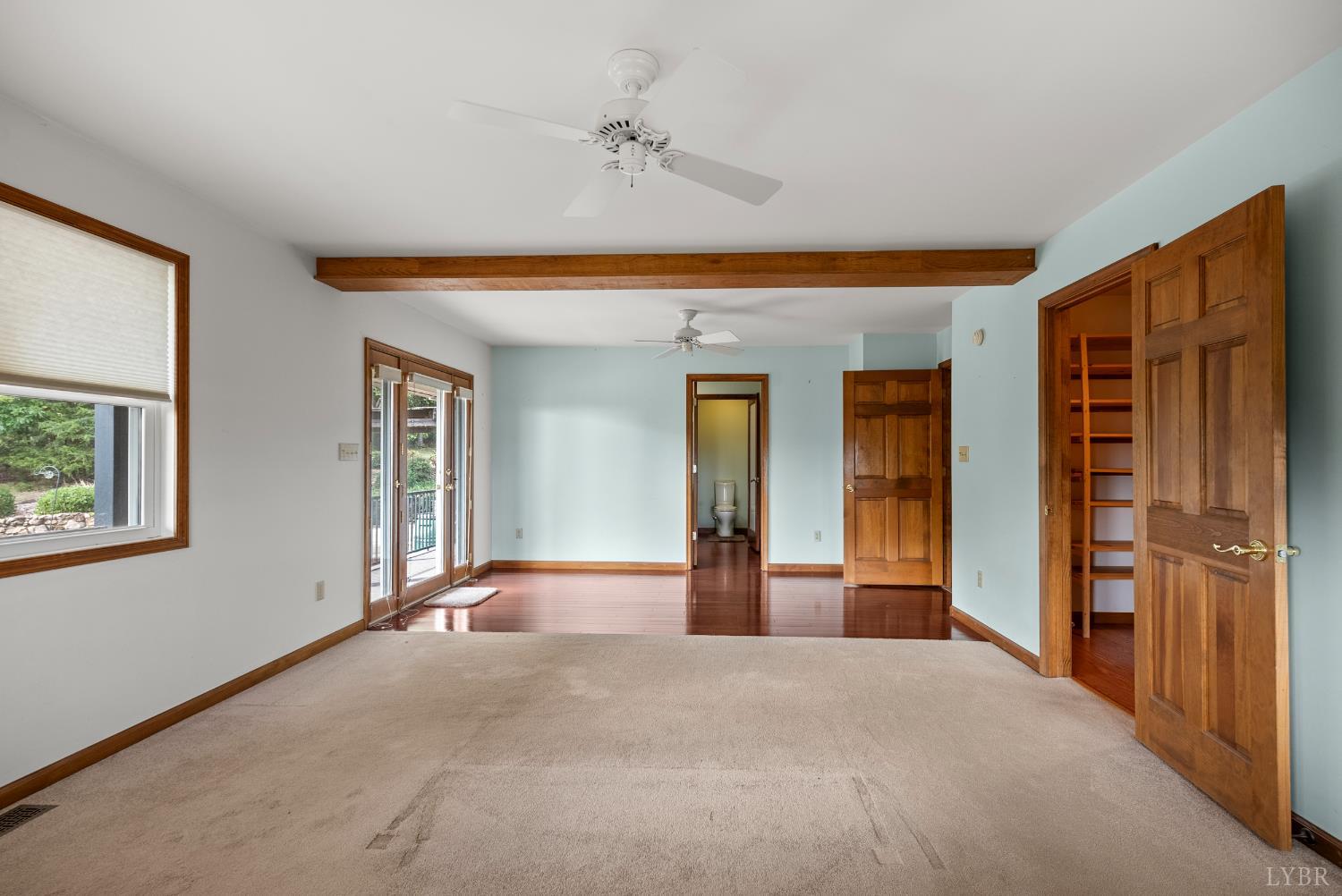 1704 Dearing Ford Road Altavista, VA 24517 - Photo 29 of 82 a view of a big room with windows and chandelier fan