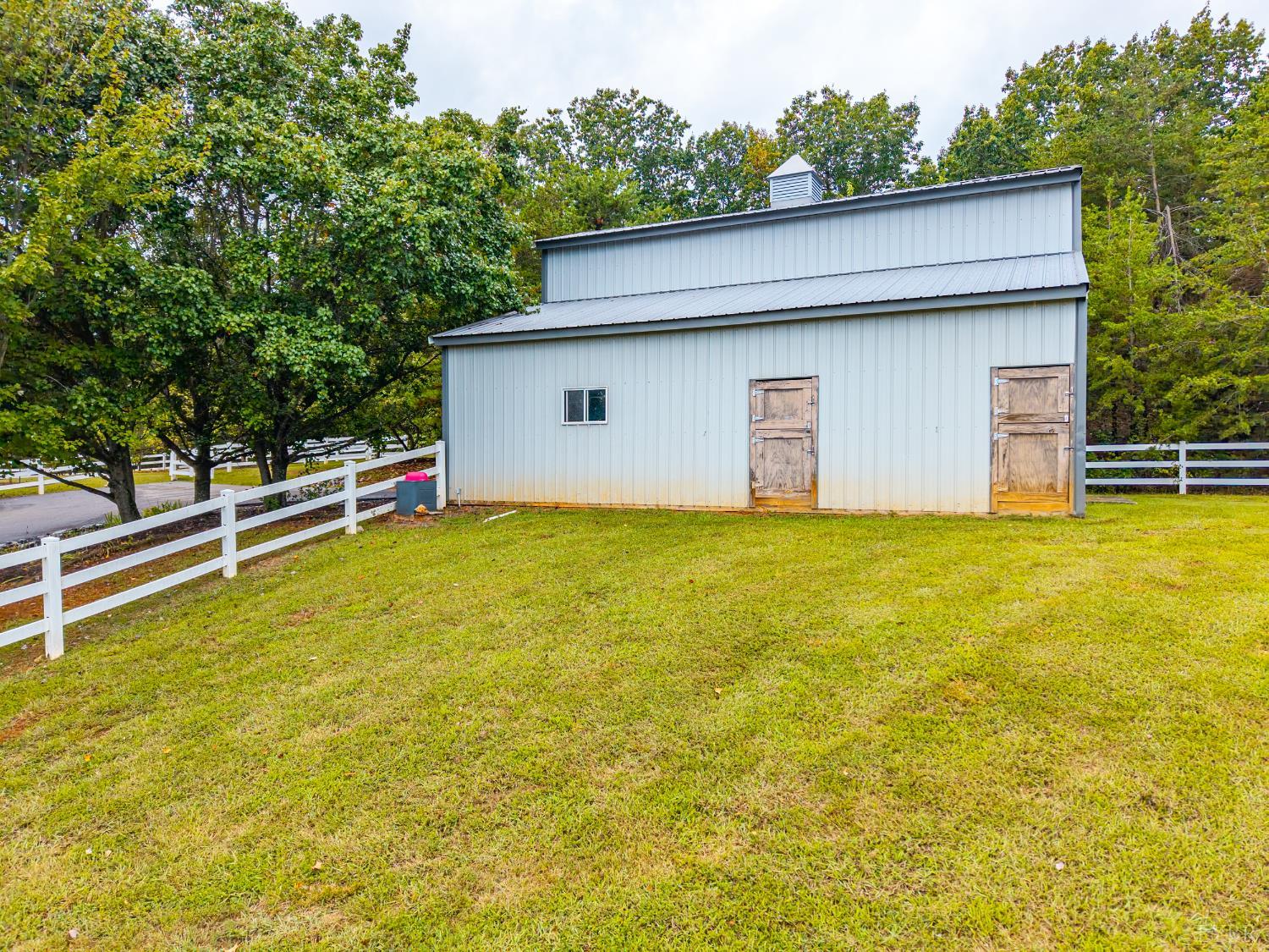 1704 Dearing Ford Road Altavista, VA 24517 - Photo 4 of 82 a view of a house with a yard and a small pool
